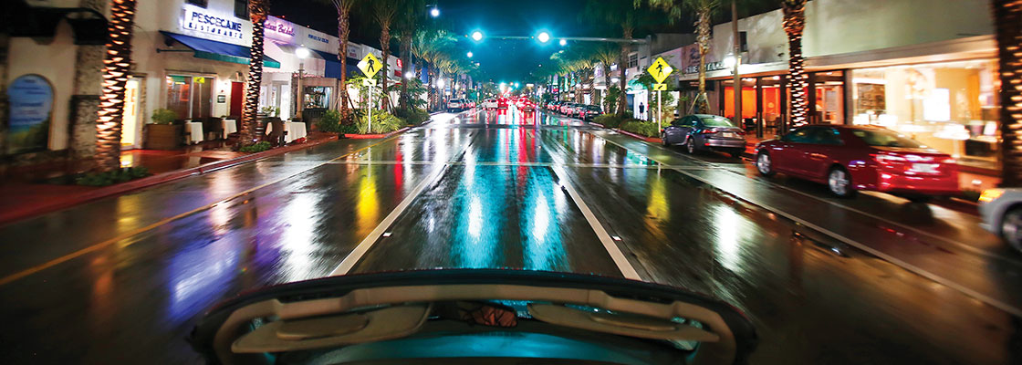 Car driving down Harding avenue at night - photo courtesy of Jacober Creative
